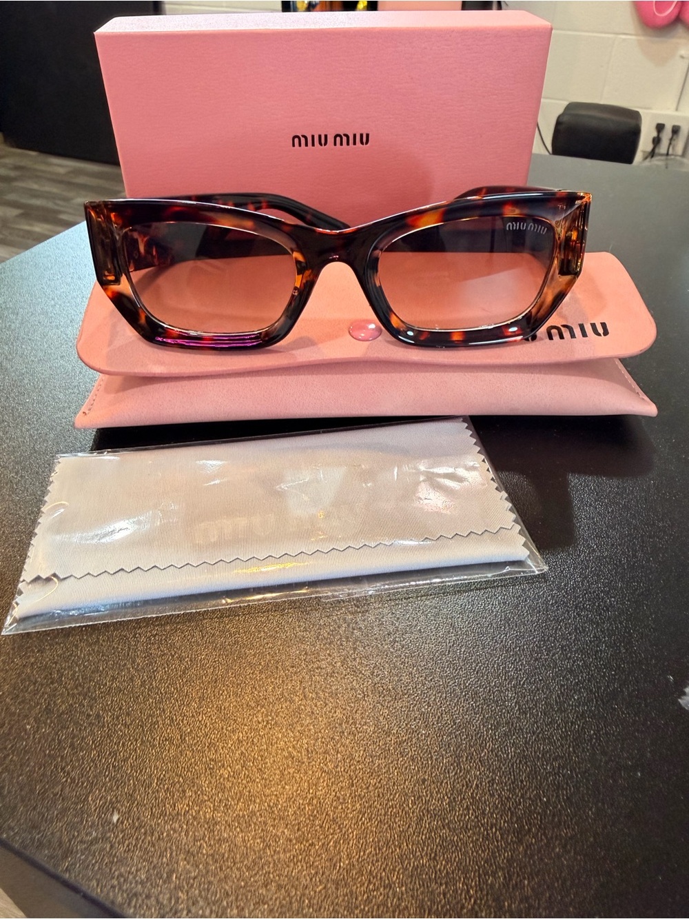 Miu Miu Tortoiseshell Cat-Eye Sunglasses with Brown Gradient Lenses
